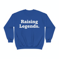Royal blue crewneck with bold white vinyl text Raising Legends