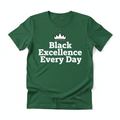Forest green t-shirt with bold white vinyl text Black Excellence Every Day with crown graphic
